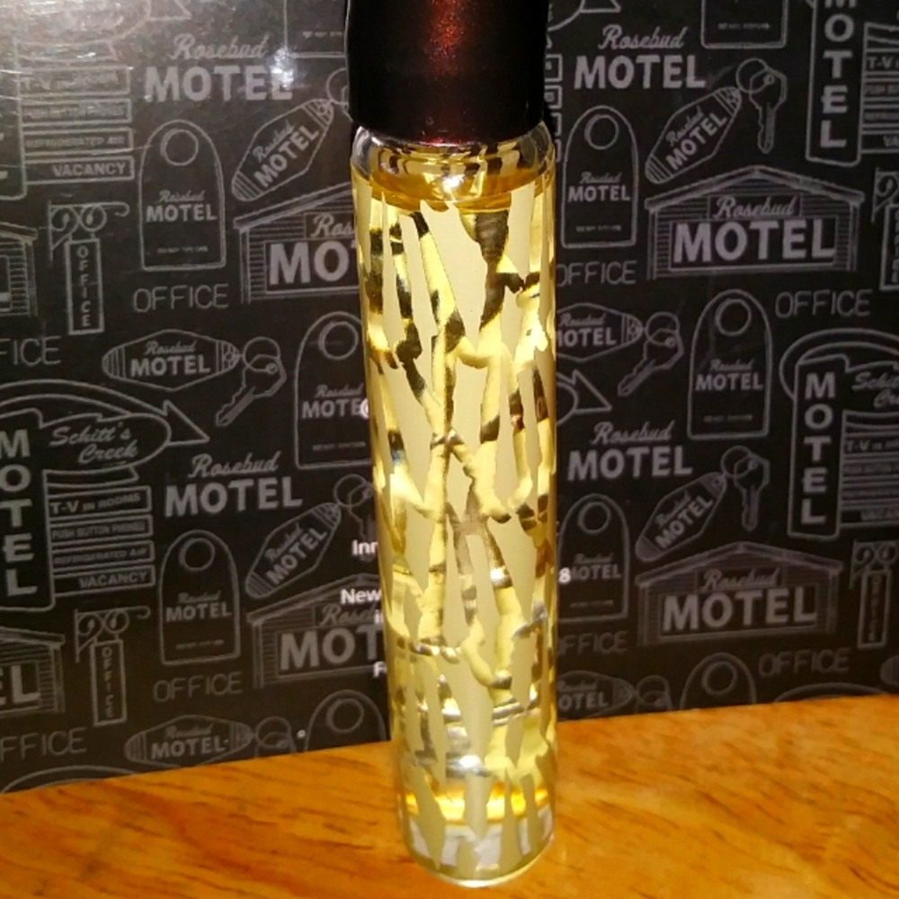 Origins Ginger Essence" rollerball perfume